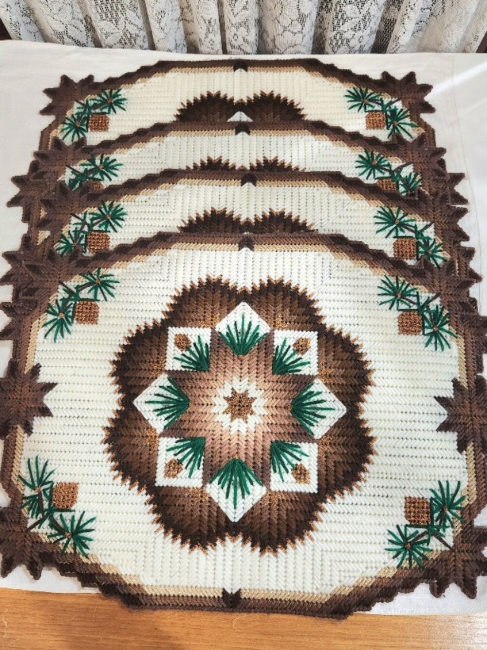 4 handcrafted needlepoint/plastic canvas project placemats
